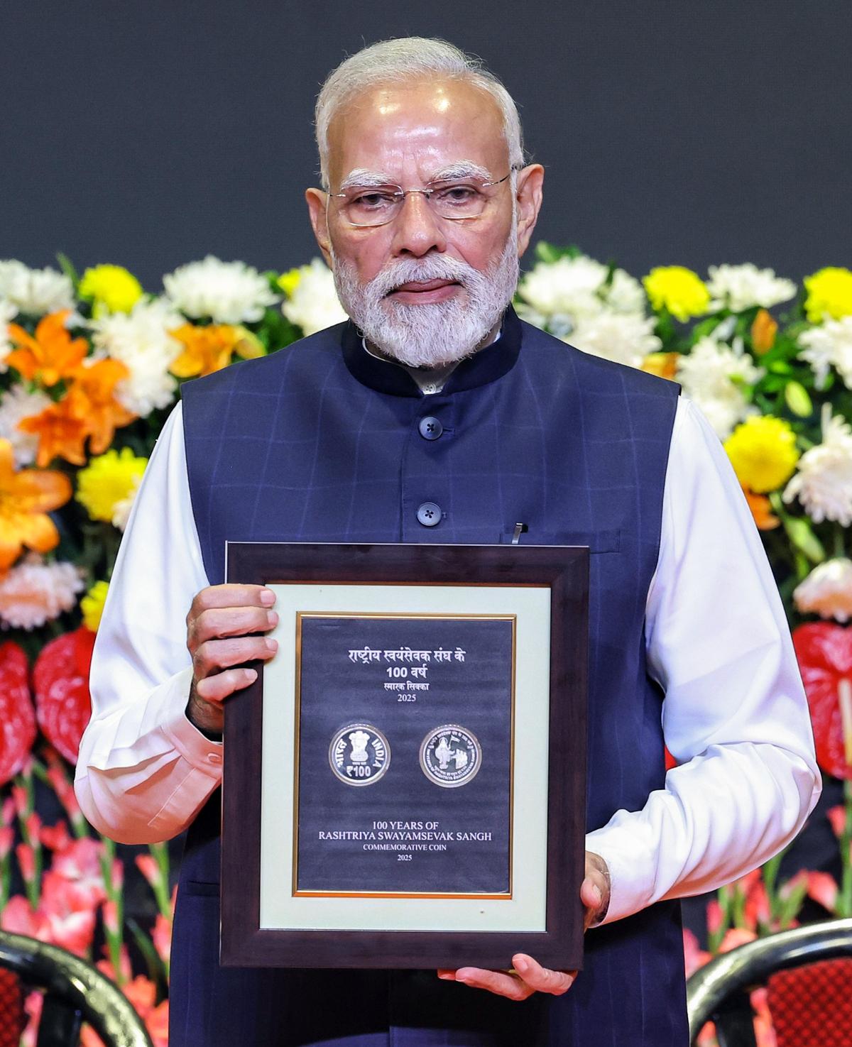PM Modi unveils ₹100 Coin, Stamp at RSS Centenary!