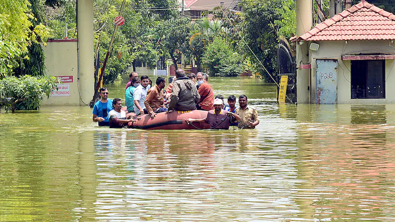 Boats on Bengaluru roads! city sinks under record May rains
