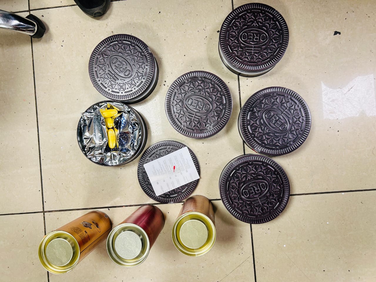 Woman arrested at Mumbai airport for ₹62.6 crore cocaine haul hidden in Oreo boxes!