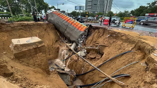 Road splits open in Gurugram, liquor truck swallowed in the fall! Watch video
