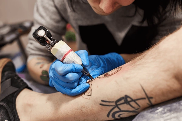 First tattoo? Read this expert-approved guide to avoid regrets, pain & infections!